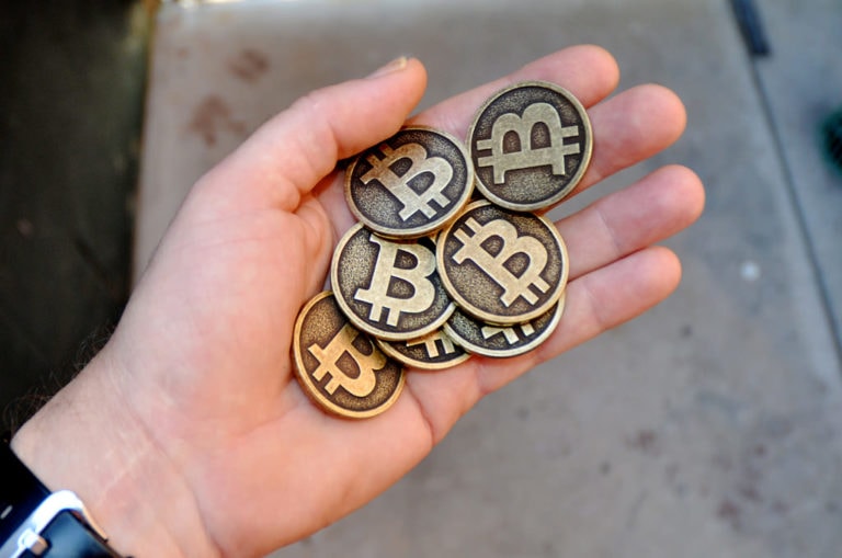 bitcoins in hand